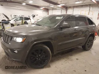 2018 Jeep Grand Cherokee Laredo E with VIN 1C4RJFAG6JC499261, listed as a IAAI auction lot 41033418 with 67,554 mi miles and . Bid and sale history available at DreamBid. Image 2.