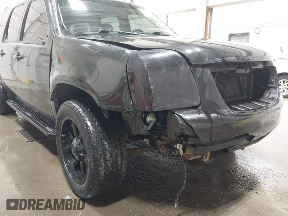 2013 GMC Yukon XL SLT z VIN 1GKS2KE74DR344229, wystawiony jako IAAI lot #42105738 z przebiegiem 147 339 mil mil oraz . Historia ofert i sprzedaży dostępna na DreamBid. Obrazek 6.