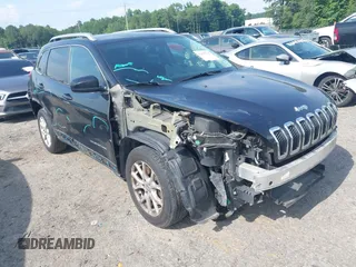 2016 Jeep Cherokee Latitude with VIN 1C4PJLCB4GW287540, listed as a IAAI auction lot 42517646 with 154,501 mi miles and . Bid and sale history available at DreamBid. Image 1.
