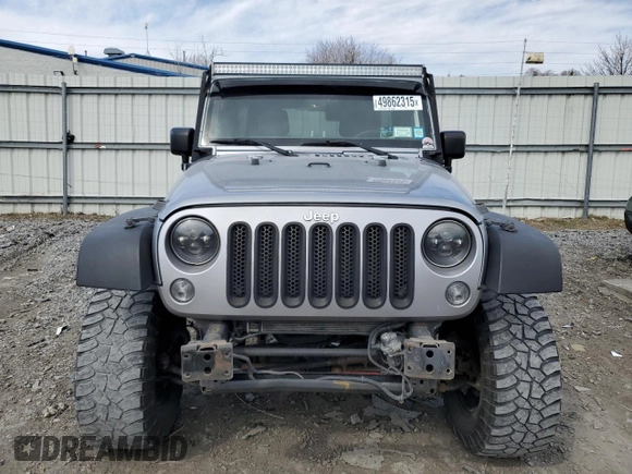 2014 Jeep Wrangler Unlimited Sport with VIN 1C4BJWDG3EL108151, listed as a Copart auction lot 49862315 with 104,417 mi miles and Salvage Title. Bid and sale history available at carsss.com. Image 5.