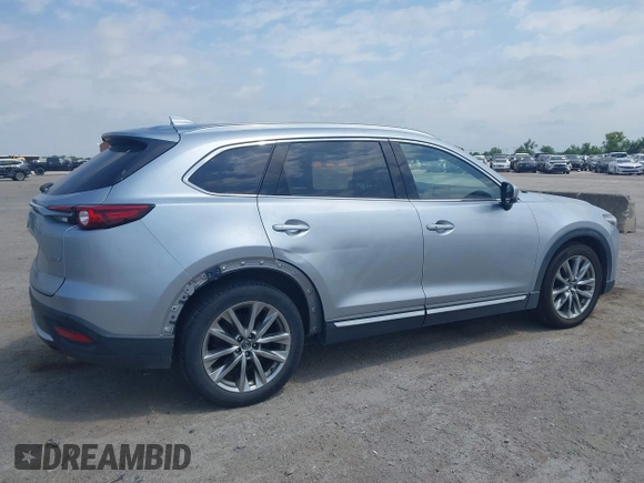 2016 Mazda CX-9 Signature with VIN JM3TCBEY9G0117785, listed as a IAAI auction lot 42331883 with 115,096 mi miles and . Bid and sale history available at DreamBid. Image 6.