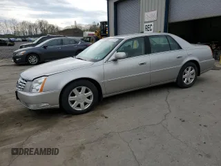 2007 Cadillac DTS V8 z VIN 1G6KD57Y17U142403, wystawiony jako Copart lot #54829245 z przebiegiem 141 018 mil mil oraz Szkody całkowita. Historia ofert i sprzedaży dostępna na DreamBid. Obrazek 1.