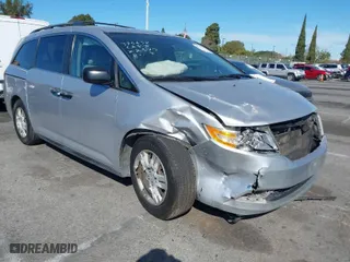 2013 Honda Odyssey LX with VIN 5FNRL5H2XDB065141, listed as a IAAI auction lot 41712328 with 174,020 mi miles. Bid and sale history available at carsss.com. Image 1.