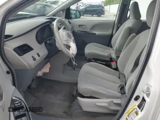 2012 Toyota Sienna with VIN 5TDZK3DC6CS244891, listed as a Copart auction lot 54442055 with 137,680 mi miles and Salvage title. Bid and sale history available at DreamBid. Image 7.