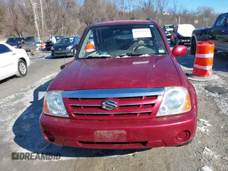 2004 Suzuki XL7 LX z VIN JS3TX92V844110977, wystawiony jako IAAI lot #41343611 z przebiegiem 64 773 mil mil oraz . Historia ofert i sprzedaży dostępna na DreamBid. Obrazek 13.