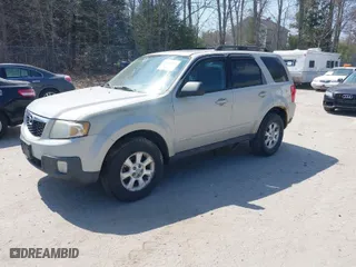 2008 Mazda Tribute Touring with VIN 4F2CZ02Z78KM05402, listed as a IAAI auction lot 42076021 with 237,405 mi miles. Bid and sale history available at carsss.com. Image 2.