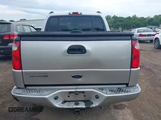 2004 Ford Explorer Sport Trac XLS z VIN 1FMDU77K74UA77223, wystawiony jako IAAI lot #42167996 z przebiegiem Nie podano mil oraz . Historia ofert i sprzedaży dostępna na DreamBid. Obrazek 16.