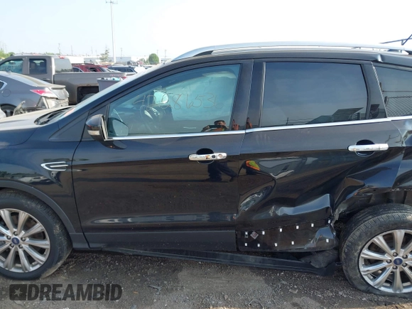 2018 Ford Escape Titanium with VIN 1FMCU9J95JUB30803, listed as a IAAI auction lot 42286536 with 63,309 mi miles and . Bid and sale history available at DreamBid. Image 15.