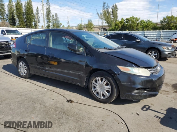 2010 Honda Insight LX with VIN JHMZE2H50AS009869, listed as a Copart auction lot 53031515 with 194,860 mi miles and Salvage Title. Bid and sale history available at DreamBid. Image 4.