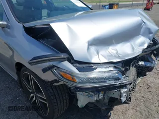 2016 Honda Accord Touring with VIN 1HGCT2B03GA000691, listed as a IAAI auction lot 42009414 with 70,306 mi miles and . Bid and sale history available at DreamBid. Image 20.