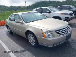 2009 Cadillac DTS 1SA z VIN 1G6KD57Y19U127449, wystawiony jako IAAI lot #42116152 z przebiegiem 107 901 mil mil oraz . Historia ofert i sprzedaży dostępna na DreamBid. Obrazek 1.