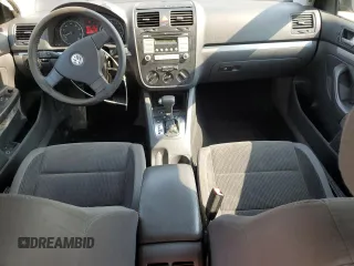 2009 Volkswagen Jetta S with VIN 3VWJM71K69M154382, listed as a Copart auction lot 60513215 with 193,278 mi miles and Salvage title. Bid and sale history available at DreamBid. Image 8.