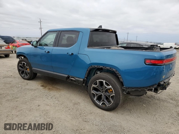 2023 Rivian R1T Launch Edition with VIN 7FCTGAAL7PN019188, listed as a Copart auction lot 55100405 with 13,654 mi miles and Salvage Title. Bid and sale history available at DreamBid. Image 2.