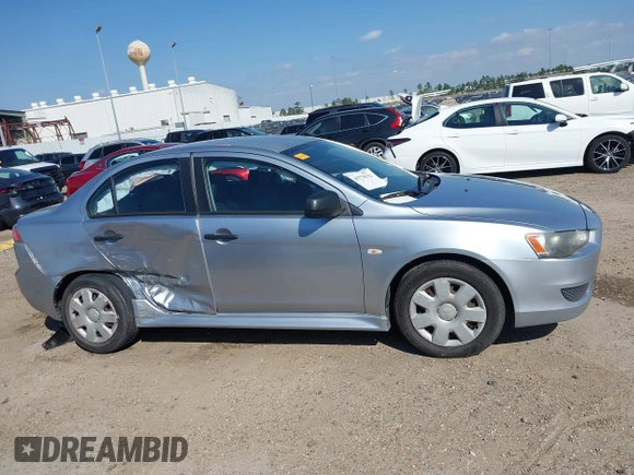 2010 Mitsubishi Lancer DE with VIN JA32U1FU4AU015574, listed as a IAAI auction lot 41770332 with 125,458 mi miles. Bid and sale history available at carsss.com. Image 12.