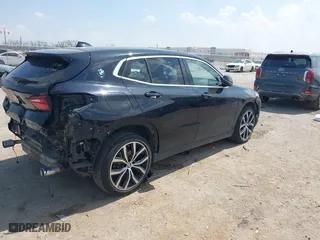2018 BMW X2 xDrive28i with VIN WBXYJ5C33JEF80454, listed as a IAAI auction lot 41876188 with 34,596 mi miles. Bid and sale history available at carsss.com. Image 4.