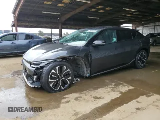 2023 Kia EV6 Wind z VIN KNDC34LA1P5149689, wystawiony jako Copart lot #54233295 z przebiegiem 64 210 mil mil oraz Czysty tytuł • Clean title. Historia ofert i sprzedaży dostępna na DreamBid. Obrazek 1.