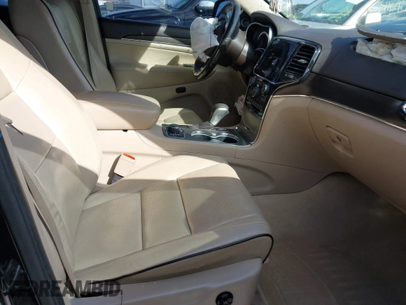 2019 Jeep Grand Cherokee Overland with VIN 1C4RJFCGXKC688543, listed as a IAAI auction lot 41643678 with 65,182 mi miles. Bid and sale history available at carsss.com. Image 5.