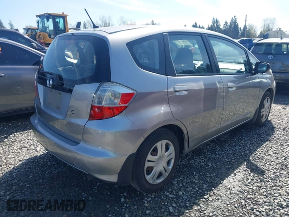 2010 Honda Fit with VIN JHMGE8H20AC010062, listed as a IAAI auction lot 41964011 with 104,651 mi miles. Bid and sale history available at carsss.com. Image 4.