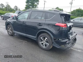2018 Toyota RAV4 XLE with VIN 2T3WFREVXJW501296, listed as a IAAI auction lot 42358130 with 163,669 mi miles and . Bid and sale history available at DreamBid. Image 3.