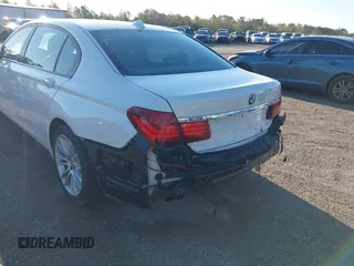 2014 BMW 7 Series ALPINA B7 with VIN WBAYE8C59ED134562, listed as a IAAI auction lot 41806222 with 120,043 mi miles. Bid and sale history available at carsss.com. Image 6.
