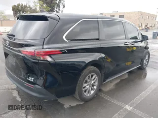 2022 Toyota Sienna XLE with VIN 5TDYRKEC8NS126392, listed as a IAAI auction lot 41912544 with 120,801 mi miles and . Bid and sale history available at DreamBid. Image 4.