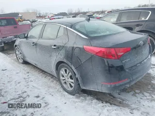 2013 Kia Optima EX with VIN 5XXGN4A72DG143975, listed as a IAAI auction lot 41385803 with 216,203 mi miles. Bid and sale history available at carsss.com. Image 3.