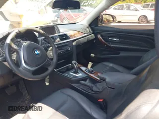 2014 BMW 4 Series 428i xDrive with VIN WBA3N5C52EF716998, listed as a IAAI auction lot 42548467 with 212,418 mi miles and . Bid and sale history available at DreamBid. Image 5.
