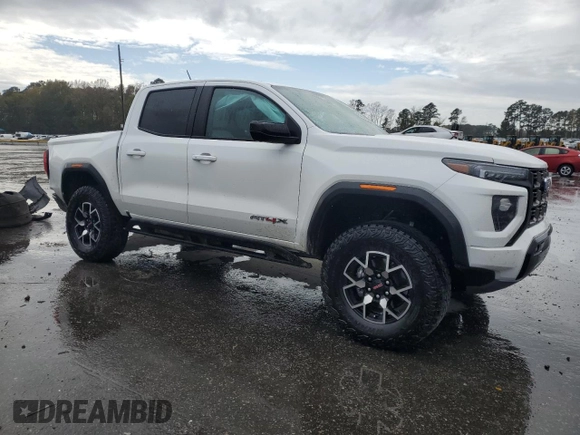 2024 GMC Canyon 4WD AT4X with VIN 1GTP6EEKXR1134879, listed as a Copart auction lot 80822964 with 12,567 mi miles and Salvage Title. Bid and sale history available at carsss.com. Image 4.