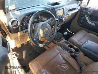 2011 Jeep Wrangler Sahara with VIN 1J4GA5D16BL567739, listed as a Copart auction lot 73542244 with 282,392 mi miles and Non Repairable. Bid and sale history available at DreamBid. Image 8.