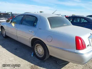 1998 Lincoln Town Car Executive with VIN 1LNFM81W7WY735628, listed as a IAAI auction lot 41333095 with 90,466 mi miles. Bid and sale history available at carsss.com. Image 3.