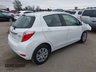 2013 Toyota Yaris L with VIN JTDKTUD38DD570483, listed as a IAAI auction lot 42071550 with 65,186 mi miles and . Bid and sale history available at DreamBid. Image 4.