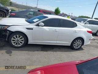 2015 Kia Optima LX with VIN KNAGM4A77F5637238, listed as a IAAI auction lot 42372825 with 139,099 mi miles and . Bid and sale history available at DreamBid. Image 15.