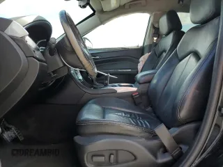 2014 Cadillac SRX with VIN 3GYFNAE38ES572951, listed as a Copart auction lot 53033685 with 104,204 mi miles and Salvage Title. Bid and sale history available at DreamBid. Image 7.