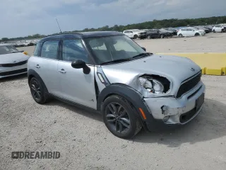 2014 MINI Countryman S with VIN WMWZC5C55EWM18087, listed as a Copart auction lot 68661614 with Not provided miles and Salvage title. Bid and sale history available at DreamBid. Image 4.