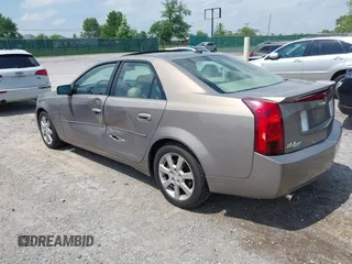 2006 Cadillac CTS z VIN 1G6DP577X60108313, wystawiony jako IAAI lot #42223144 z przebiegiem 98 329 mil mil oraz . Historia ofert i sprzedaży dostępna na DreamBid. Obrazek 3.