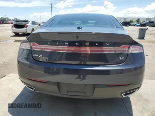 2013 Lincoln MKZ z VIN 3LN6L2GK4DR817557, wystawiony jako Copart lot #60876995 z przebiegiem 77 303 mil mil oraz Szkoda całkowita • Salvage title. Historia ofert i sprzedaży dostępna na DreamBid. Obrazek 6.