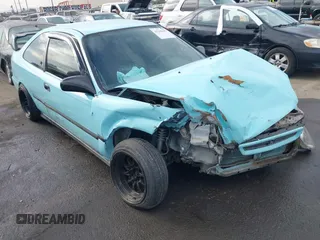 1998 Honda Civic HX with VIN 1HGEJ7127WL127977, listed as a IAAI auction lot 41230187 with 182,000 mi miles. Bid and sale history available at carsss.com. Image 1.