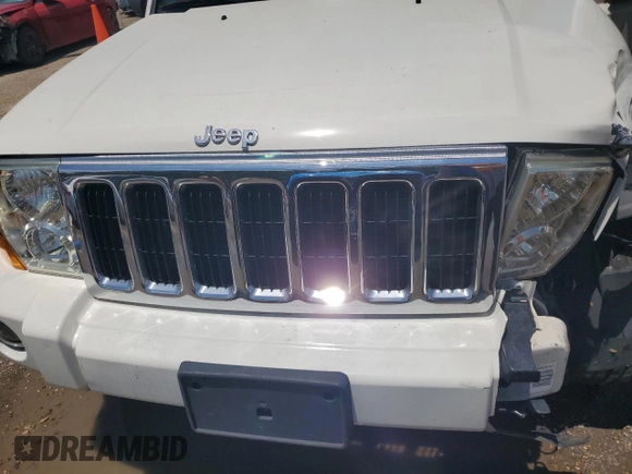 2007 Jeep Commander Limited z VIN 1J8HH582X7C507939, wystawiony jako Copart lot #64052895 z przebiegiem Nie podano mil oraz Szkoda całkowita • Salvage title. Historia ofert i sprzedaży dostępna na DreamBid. Obrazek 12.