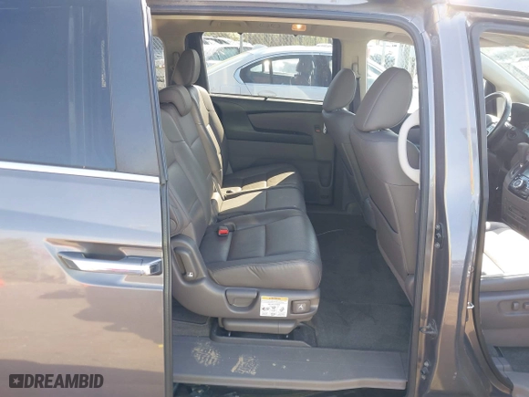2016 Honda Odyssey EX-L with VIN 5FNRL5H65GB024360, listed as a IAAI auction lot 42005732 with 82,667 mi miles. Bid and sale history available at carsss.com. Image 8.