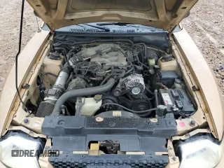 2000 Ford Mustang z VIN 1FAFP404XYF179209, wystawiony jako Copart lot #56727285 z przebiegiem 268 415 mil mil oraz Szkoda całkowita • Salvage title. Historia ofert i sprzedaży dostępna na DreamBid. Obrazek 11.