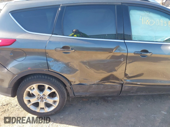 2015 Ford Escape Titanium with VIN 1FMCU9J9XFUB46843, listed as a IAAI auction lot 41800938 with 91,034 mi miles. Bid and sale history available at carsss.com. Image 6.