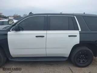 2018 Chevrolet Tahoe Commercial with VIN 1GNLCDEC1JR312458, listed as a IAAI auction lot 41371563 with 114,086 mi miles. Bid and sale history available at carsss.com. Image 14.