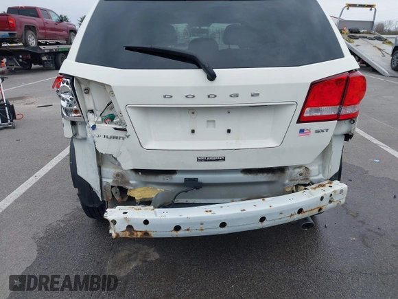 2013 Dodge Journey SXT with VIN 3C4PDCBG9DT564303, listed as a IAAI auction lot 41954764 with 132,125 mi miles. Bid and sale history available at carsss.com. Image 6.