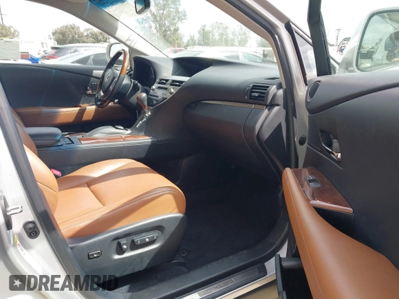 2013 Lexus RX 450h with VIN JTJZB1BAXD2409160, listed as a IAAI auction lot 41916721 with 62,599 mi miles and . Bid and sale history available at DreamBid. Image 5.
