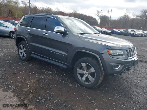 2014 Jeep Grand Cherokee Overland with VIN 1C4RJFCG5EC329377, listed as a IAAI auction lot 40822324 with 106,222 mi miles. Bid and sale history available at carsss.com. Image 1.