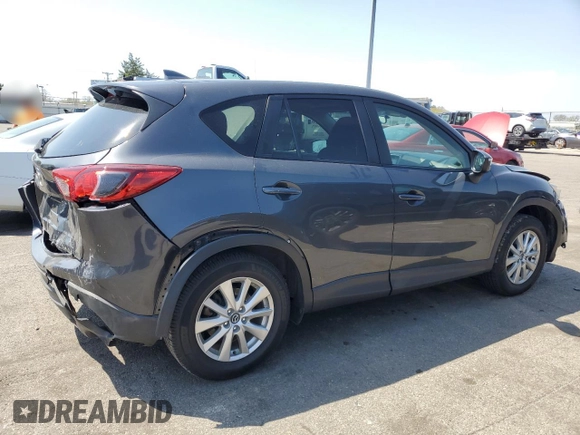2016 Mazda CX-5 Touring with VIN JM3KE2CY2G0612029, listed as a Copart auction lot 53810155 with 159,915 mi miles and Salvage Title. Bid and sale history available at DreamBid. Image 3.