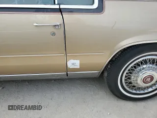 1985 Cadillac Eldorado z VIN 1G6EL578XFE614641, wystawiony jako Copart lot #75663984 z przebiegiem 54 128 mil mil oraz Szkody całkowita. Historia ofert i sprzedaży dostępna na DreamBid. Obrazek 12.
