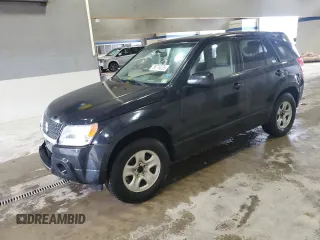 2009 Suzuki Grand Vitara z VIN JS3TE042694100010, wystawiony jako Copart lot #56716225 z przebiegiem 148 495 mil mil oraz Szkoda całkowita • Salvage title. Historia ofert i sprzedaży dostępna na DreamBid. Obrazek 1.