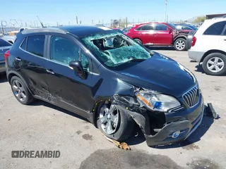 2014 Buick Encore Leather with VIN KL4CJCSB2EB606805, listed as a IAAI auction lot 41882649 with 73,935 mi miles. Bid and sale history available at carsss.com. Image 1.