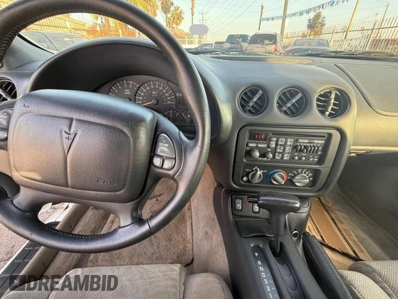 1997 Pontiac Firebird Firebird with VIN 2G2FS32K3V2232171, listed as a Copart auction lot 46740375 with 64,745 mi miles and Salvage title. Bid and sale history available at DreamBid. Image 6.